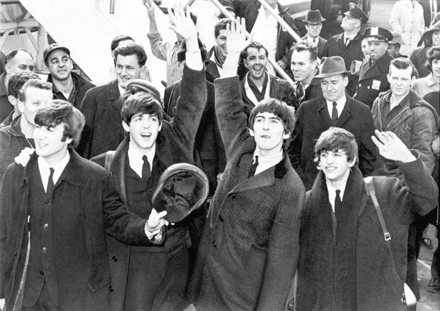 Credit: Library of Congress Caption: The Beatles land at JFK airport in New York, February 7, 1964, for their first American performances including the Ed Sullivan Show.