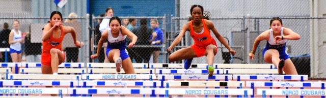 Featured Photos 4-25-2025 - Baseball, Track, Softball, Arts Festival - Baseball Scoreboard. (L-R) Roosevelt’s Ellie De La Torre, Norco’s Audrina Ponce, Roosevelt’s Alyssa Jones, and Norco’s Emmalee Snow participate in the 100 meters hurdles. Jones won the race. Credit: Photo by Gary Evans