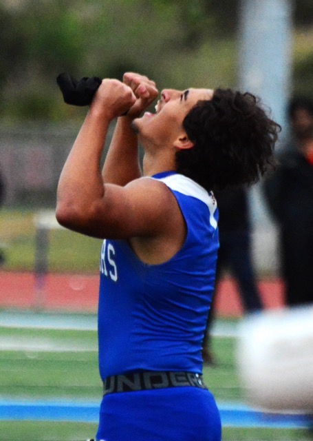 Norco’s Dillon Dawud celebrates his personal record run of 23.37 in the boys’ 200 dash against Roosevelt. Photo by Gary Evans