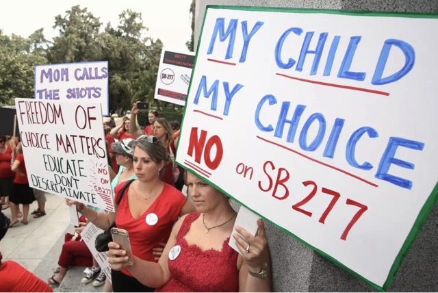 Vaccine Requirements. Karman Willmer, left, and Shelby Messenger protest against SB 277, a measure requiring California schoolchildren to get vaccinated, at a Capitol rally on June 9 in Sacramento. (Rich Pedroncelli / Associated Press)