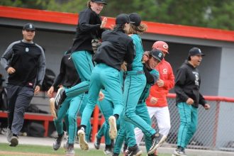 The Corona Sanitago baseball team celebrates its 1-0 win at Corona in a Big VIII League game. It was first loss for Corona in the Big VIII League since 2023.