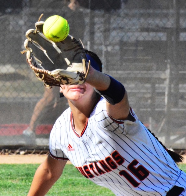 Eastvale Roosevelt’s Eva Bustamante (16) makes a diving catch in the top of the fifth inning, preserving the Mustangs’ 1 – 0 lead and eventual game-winning lead over Fullerton in the first round of the CIF playoffs. Roosevelt lost to La Mirada 12 – 4 in the second round.