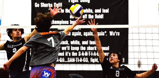 Featured Photos 5-16-25. Santiago’s Kingston Foote (2) and Reyce Ongalibang (8) jump to block Westlake’s Matthew Currey’s (7) bump during the pivotal third game. Credit: Photo by Gary Evans