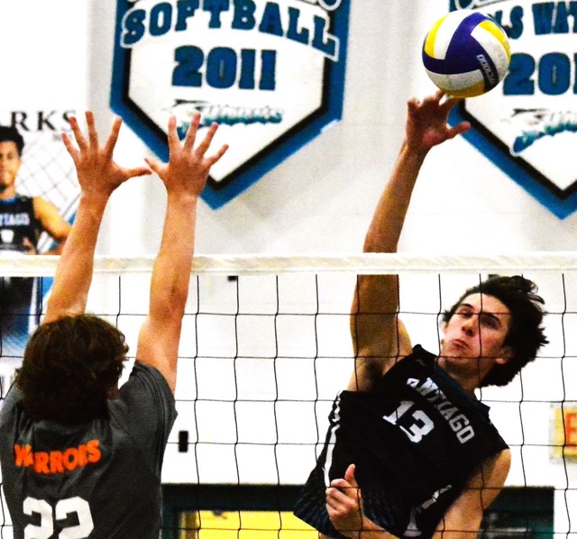 Westlake’s Connor Young (22) tries to block a shot by Santiago’s Pierce Willardson (13) during the Sharks victory over the Warriors.  
Credit: Photo by Gary Evans
