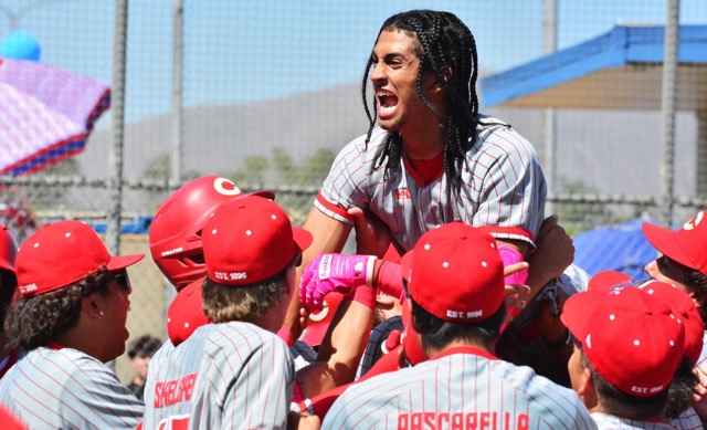 Corona’s Anthony Murphy leaps into his teammate’s arms at home plate after blasting a lead-off home run in the first inning to give the Panthers a 1-0 lead over Norco during the CIF Southern Section Division 1 baseball quarterfinal game at Norco High. Corona added a run later on to beat Norco 2-0. Top-seeded Corona was then upset by St John Bosco in the semi-final on Tuesday, by the same 2-0 score.
