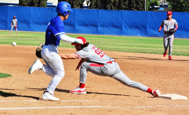 Norco’s Zion Martinez (left) digs for first while Corona first baseman Gavin Flores stretches for the throw from shortstop Billy Carlson for the out.  In the background, centerfielder Anthony Murphy and second baseman Trey Ebel watch.  Top-seeded Corona was upset in the semi-final by St John Bosco.