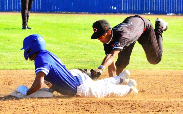 Corona Centennial second baseman Ethan Miller is late with the tag on Norco’s Marcus Blanton at second base.  The Cougars advanced in the CIF baseball playoffs with a 9 – 2 victory over the Huskies. After defeating Laguna Beach 4-2, Norco takes on another league rival, top-ranked Corona, this afternoon (Friday, May 23rd) in the Division 1 quarter finals.