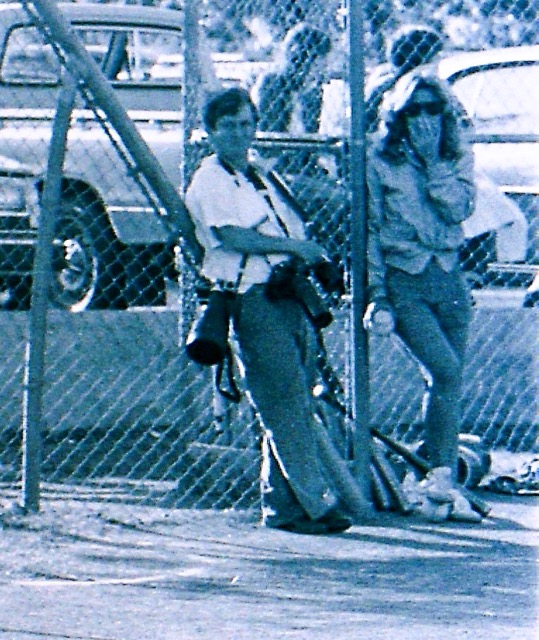 Jerry Soifer at the old Corona High softball field, now the Historic Civic Center. Longtime Corona High softball coach Linda Chitwood, stands behind him.