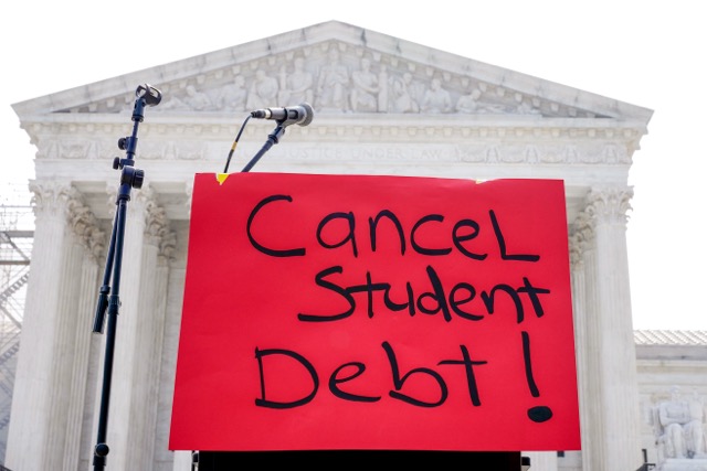 A sign reading "cancel student debt" is seen outside the Supreme Court, June 30, 2023, in Washington. Credit: AP Photo/Mariam Zuhaib