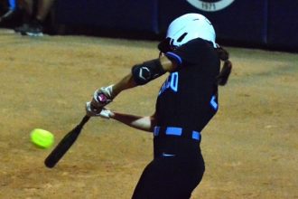 Featured Photos 06-06-2025. Norco’s third baseman Sadie Burroughs, hammers a line drive that bounced off the left field wall for a standup double. The drive ignited a three-run Cougar outburst that proved to be the difference as Norco defeated El Modeno of Orange 3 – 0 to win the CIF Division 1 CIF Championship. It’s the Cougars’ seventh crown in 10 trips to the finals starting in 2003.