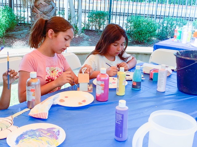 The event organizers offered birdhouses that children enjoyed painting and decorating. Photo by Mia Rotell.