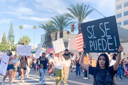 Downtown Riverside Demonstrators. Prior to the alleged hit-and-run, the protest was peaceful, and demonstrators “weren’t angry or tense, it was fun and celebratory,” for hours before the attack around 9 pm. This photo in the area of University Avenue and Main Street in Riverside was taken 2 hours earlier. Credit: Photo by Mia Rotell