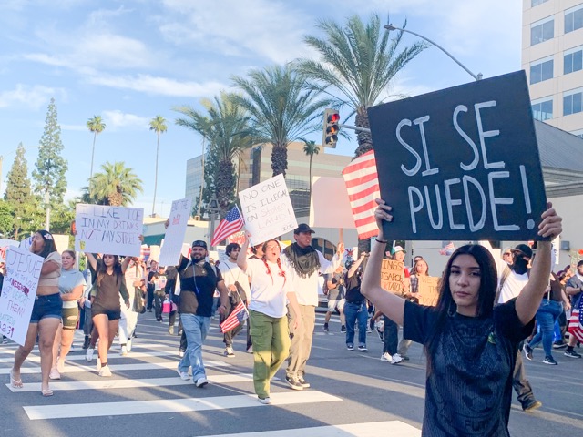 Downtown Riverside Demonstrators. Prior to the alleged hit-and-run, the protest was peaceful, and demonstrators “weren’t angry or tense, it was fun and celebratory,” for hours before the attack around 9 pm. This photo in the area of University Avenue and Main Street in Riverside was taken 2 hours earlier. Credit: Photo by Mia Rotell