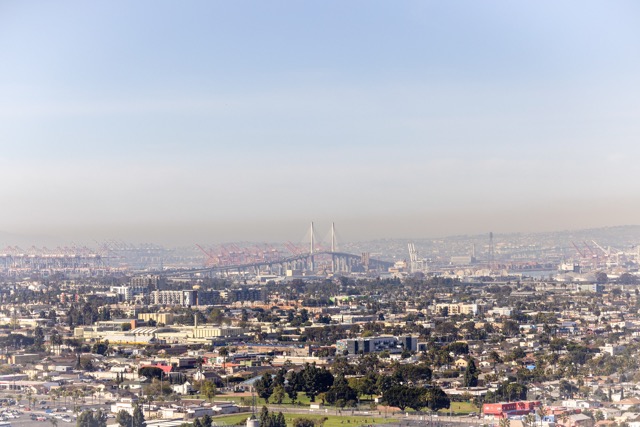 Gas Furnaces. Smog lingers over the city overlooking the Ports of Long Beach and Los Angeles as seen from Signal Hill, Calif., on Monday, March 10, 2025.  Credit: AP Photo/Etienne Laurent