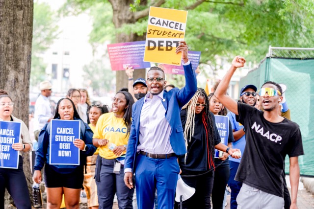 Student Loan debt. People demonstrate in Lafayette Park across from the White House in Washington, June 30, 2023, after a sharply divided Supreme Court has ruled that the Biden administration overstepped its authority in trying to cancel or reduce student loan debts for millions of Americans. 

Credit: AP Photo/Andrew Harnik