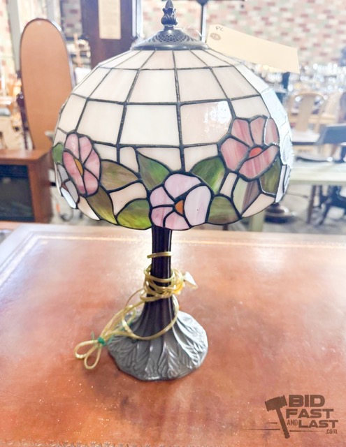 Estate Auction. A stained glass lamp up for auction Credit: bidfastandlast.com