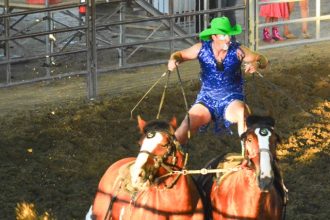 Austin Singley, the Green Hat Clown, performs Sunday afternoon at the Norco Mounted Posse PRCA Rodeo.