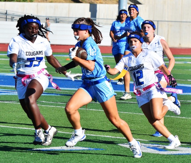 Norco’s Aaliyah Taylor (12) tries to get past Beaumont’s Doris Arko-Mensah (33) and Rian Quiroz (12).