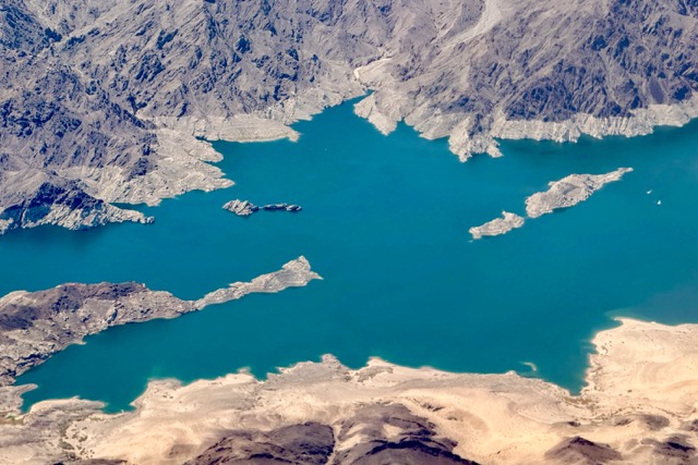 Colorado River. Colorado River, Aerial view of Boulder Basin, the northwestern arm of Lake Mead, shows the bathtub ring, indicator of long-term water loss, between Boulder City, Nevada, and the Las Vegas metropolitan area on July 3, 2025. 
