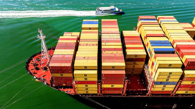 Cargo Movement. Ports. Cargo containers fill a ship at the Port of Oakland on Wednesday, Aug. 6.  Credit: Noah Berger,  AP