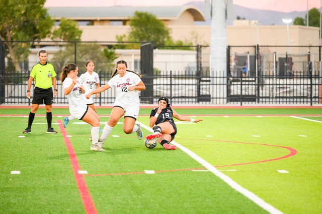 America Chavez (19) attempts a kick on the opponents box, slips, and turn over the ball