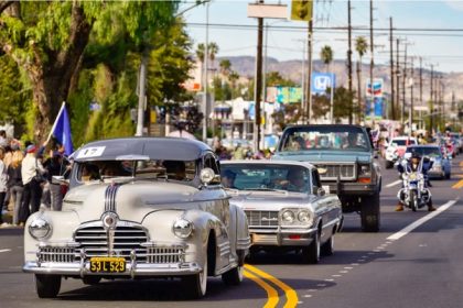 Classic Cars. Classic cars ride along Laurel Canyon Boulevard during a Veterans Day Parade in the Pacoima section of Los Angeles, on Nov. 11, 2022. Credit: AP Photo/Richard Vogel