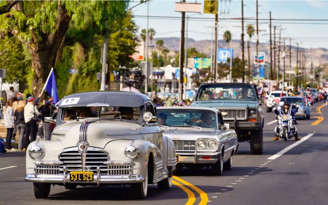 Classic Cars. Classic cars ride along Laurel Canyon Boulevard during a Veterans Day Parade in the Pacoima section of Los Angeles, on Nov. 11, 2022. Credit: AP Photo/Richard Vogel