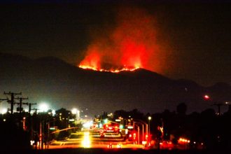 The Pyrite Fire in the mountainous area of Jurupa Valley was visible to residents and communities throughout the region. Credit: Photo by Gary Evans
