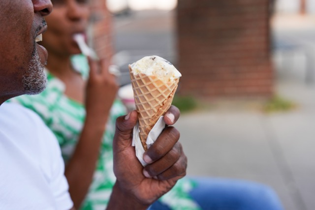 More Sugar. A person eats ice cream Friday, Sept. 5, 2025, in Cincinnati.  Credit: AP Photo/Joshua A. Bickel)