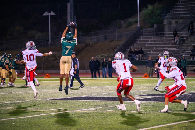 Making plays on both sides of the ball, WR Jacob Arbuckle (7) makes a grab in the middle of the Rancho Verde defense