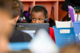 AI Chatbot. A group representing tech companies ultimately backed legislation, just signed by Gov. Gavin Newsom, mandating safeguards against self harm in chatbots. Child safety advocates backed a different bill. Students use computers in a classroom in Sacramento on May 11, 2022.  Credit: Photo by Miguel Gutierrez Jr., CalMatters