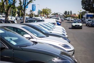 Car Dealers Bill. A line of electric vehicles at a Hyundai dealership in Fresno on Sept. 7, 2023.  Credit: Photo by Larry Valenzuela, CalMatters/CatchLight Local