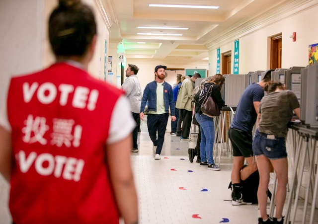 Election Monitors. Election Monitoring. Voters fill out their ballots at San Francisco City Hall on Super Tuesday in 2020.  Credit: Photo by Anne Wernikoff for CalMatters