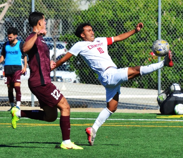 Norco College’s Ivan Morales (left) and Chaffey’s Armando Diaz (right) eye the ball after the header they were attempting bounces up away from them.