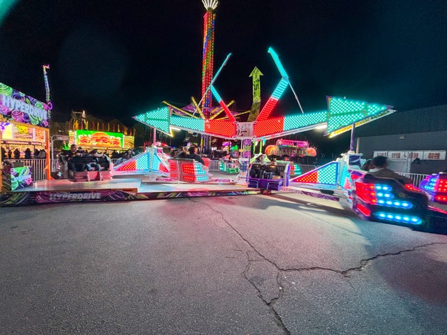 SoCal Fair. The rides included funhouses, swings, a big drop, and many others — plus the classic Ferris wheel. Photo by Mia Rotell