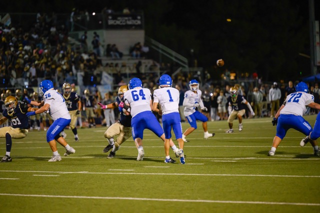 Cougar QB #1 Julian Medina has great protection as he passes to a wide open receiver, #3 Jaxon Cuellar