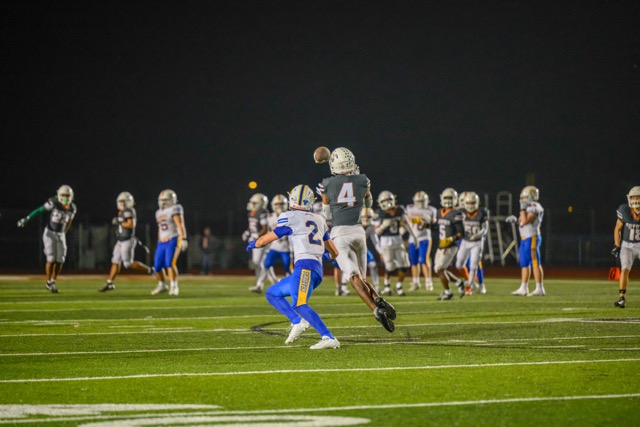 4) Devin Sandville intercepts a pass intended for (2) Tyler Starling