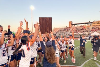 CIF Flag Football Title. Members of the Eastvale Mustang flag football family celebrate its CIF championship. Credit: CNUSB