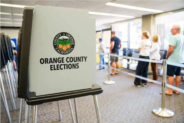 Prop 50. A line of voters at a vote center in Orange County on Tuesday. Rep. Ken Calvert disclosed he will challenge fellow Republican incumbent Young Kim in her newly drawn 40th district that will stretch east from Corona into Orange County. Reports suggest a third incumbent Republican, Darrel Issa, may join the race.

Credit: Photo by Jules Hotz for CalMatters
