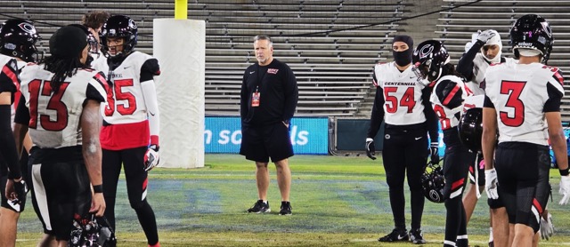 Corona Centennial Head Football Coach Matt Logan takes in the moment before addressing his team following an outstanding season in which the Huskies defeated perennial rival Mater Dei twice. 