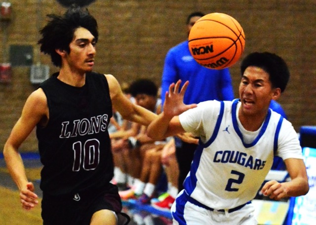 Arlington’s Ayden Lopez (10) and Norco’s Leo Rull (2) battle for the ball.