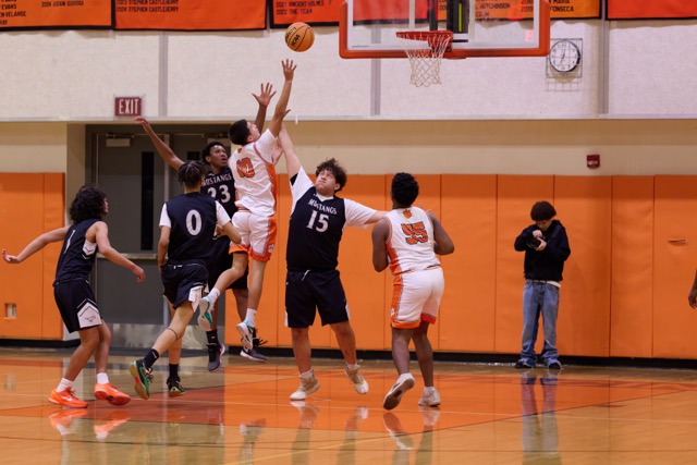 San Jacinto’s #10 Camilo Yanez splits the defenders and flies through the air to make a pretty heavily contested jump.