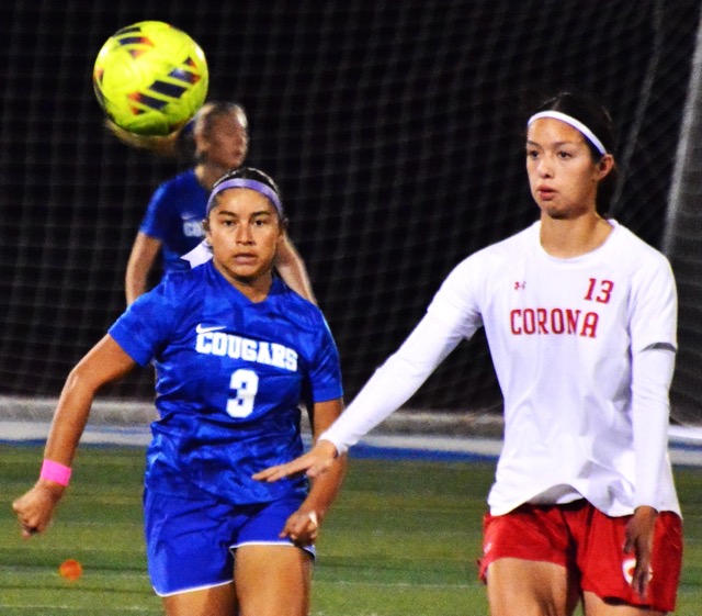 Norco’s Makayla Pacheco (3) and Corona’s Giselle Fuentes-Gonzalez (13) track the ball as the teams played to a scoreless tie.