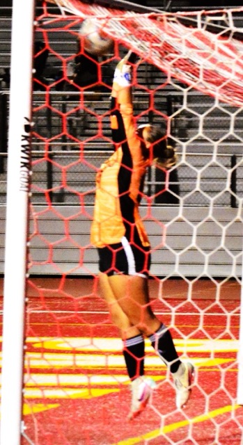Eastvale Roosevelt goalie Zoryah Davis makes a valiant leap to try and block a shot that was just under the top bar to give Corona an early 1 – 0 lead. The Mustangs responded with three goals of their own to defeat the Panthers 3 – 1.
