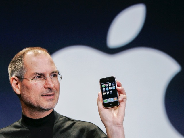 January 9. Apple CEO Steve Jobs holds up an Apple iPhone at the MacWorld Conference in San Francisco, in this Jan. 9, 2007 file photo.  Credit: AP Photo/Paul Sakuma