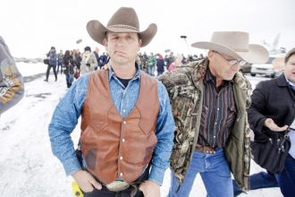 January 2. Ryan Bundy, one of the sons of Nevada rancher Cliven Bundy, walks to a news conference at Malheur National Wildlife Refuge Thursday, Jan. 7, 2016, near Burns, Ore. A small, armed group occupying the wildlife preserve has said repeatedly that local people should control federal lands, but critics say the lands are already managed to help everyone from ranchers to recreationalists.  Credit: AP Photo/Rick Bowmer)