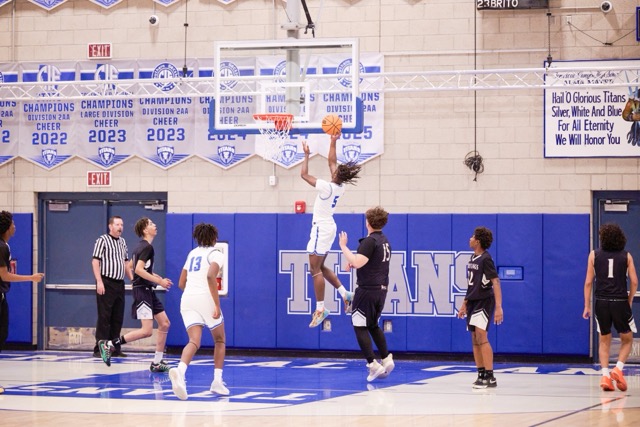 Temescal Canyon’s #5 Jahden Johnson gets way up there for the easy lay up