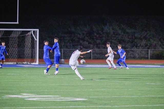 Mustangs #8 Rogelio Ortega Jr. takes a free kick on goal but is stopped by the goalkeeper