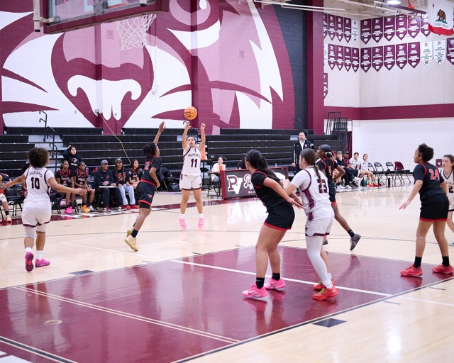 Featured Photos 01-09-2026. #11 Keila Medina pulls up for an open 2 pointer on a designed play