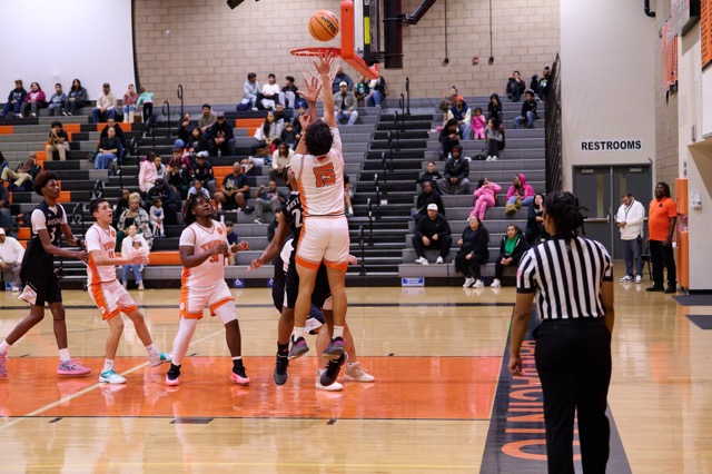 San Jacinto #15 Omar Garcia pulls up for a nice one handed hook shot after backing down his defender